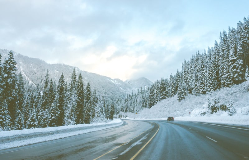  road with snow and mountain background in winter low temperature
